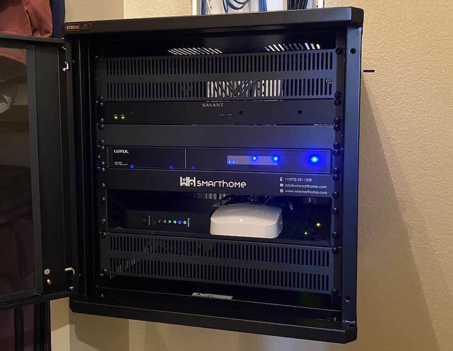 AV rack including smart home controller and Luxul professional-grade network product