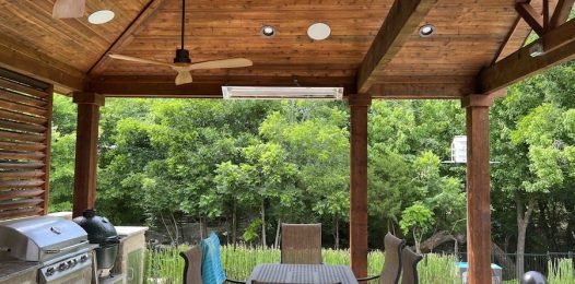 outdoor seating area with in-ceiling speaker system.