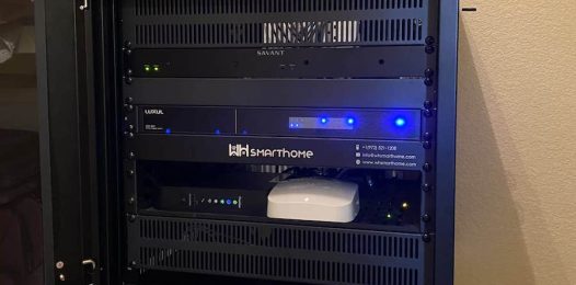 AV rack including smart home controller and Luxul professional-grade network product